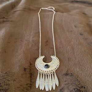 Silver necklace.